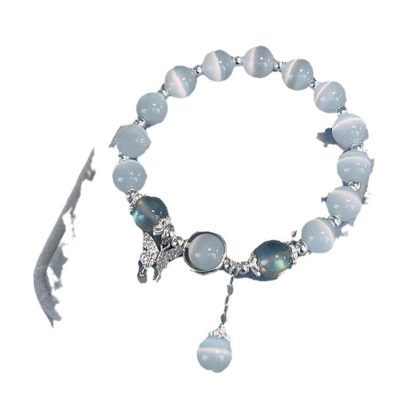 Soft Glow Beaded Bracelet with Butterfly Accent