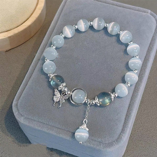 Soft Glow Beaded Bracelet with Butterfly Accent